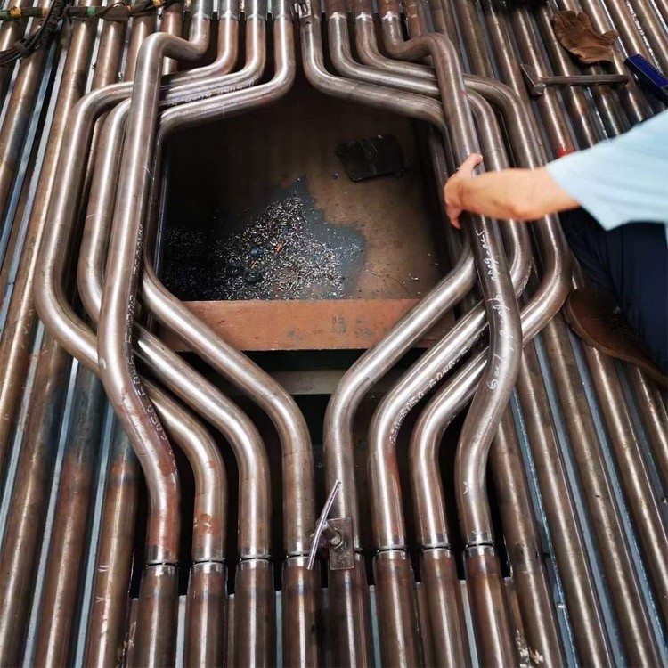 Φ38.1×7.5 SA-213T2 每件9根水冷壁管一排，長(zhǎng)12米，管節(jié)距50.8mm,鰭片連接，鰭片為膜式扁鋼厚δ6.4㎜，材料為15CrMo，采用雙面坡口焊接型式