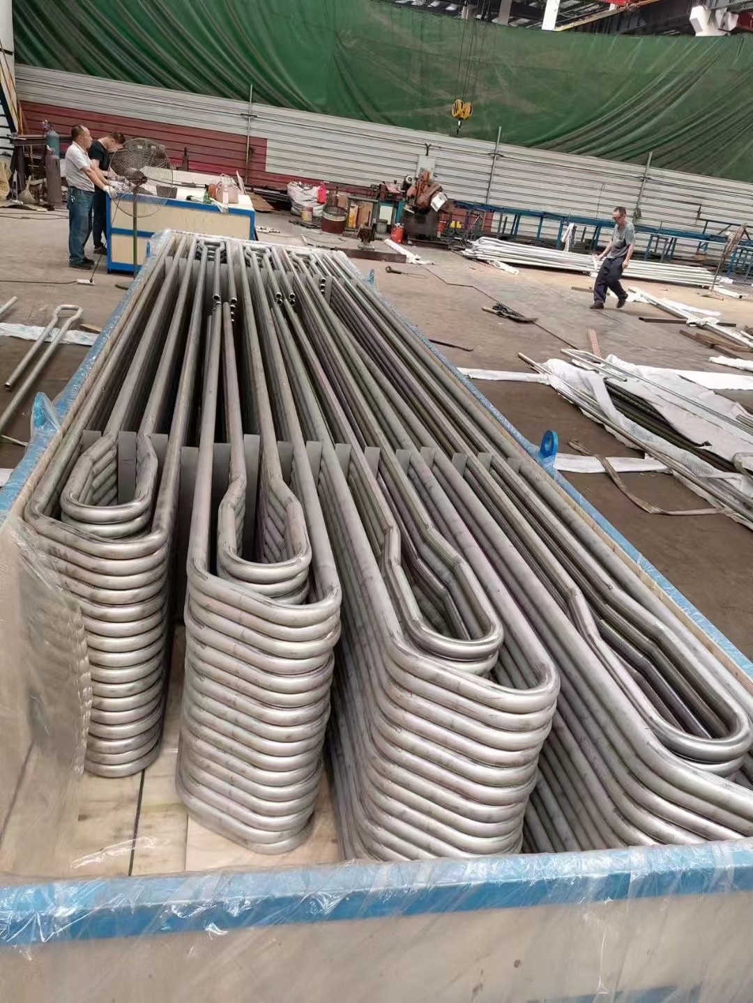 Φ38.1×7.5 SA-213T2 每件9根水冷壁管一排，長(zhǎng)12米，管節(jié)距50.8mm,鰭片連接，鰭片為膜式扁鋼厚δ6.4㎜，材料為15CrMo，采用雙面坡口焊接型式